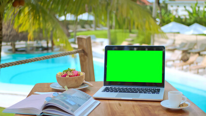 Chroma key display close up. Green screen mock up. Palm tree work cafe. Use clean computer macbook. Clear web site copy space. Blank place view. Laptop desk workspace. No man area. Rest relax day trip