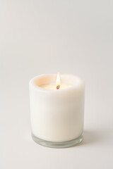 candle burning on white