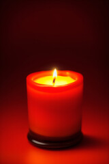 red candle in the dark