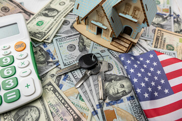 House keys  calculator and US dollar money. Real estate concept