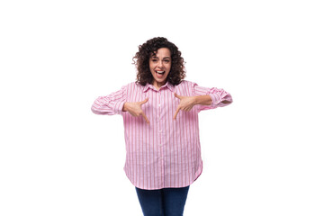 young caucasian bright woman with curly hairstyle wears stylish pink shirt