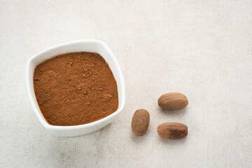 Pala Bubuk (Nutmeg Powder) on white bowl
