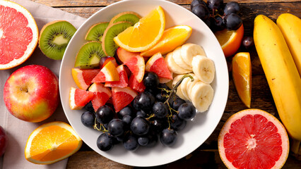 fresh fruit salad with grapefruit, grape, orange, kiwi and banana