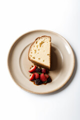 cake with strawberries and blueberry on plate