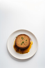 food on plate on white table