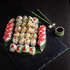 sushi on the black background