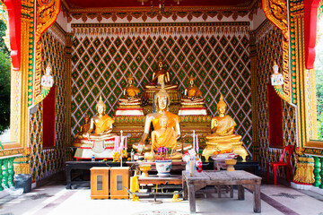 Ancient buddha statue in antique small shrine for thai people traveler travel visit respect praying blessing wish holy mystery of Wat Saen Suk or Saen Suk temple at Angthong city in Ang Thong Thailand - obrazy, fototapety, plakaty