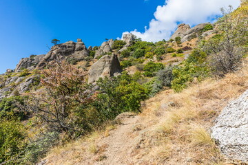 Mysterious mountain landscape of the Valley of Ghosts, a cluster of strangely shaped rocks on the western slope of Mount Demerdzhi in Crimea