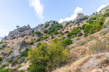Mysterious mountain landscape of the Valley of Ghosts on the western slope of Mount Demerdzhi in Crimea. Popular tourism and trekking destination