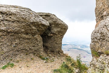 Mysterious mountain landscape of the Valley of Ghosts, a cluster of strangely shaped rocks on the western slope of Mount Demerdzhi in Crimea