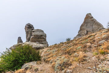 Mysterious mountain landscape of the Valley of Ghosts, a cluster of strangely shaped rocks on the western slope of Mount Demerdzhi in Crimea