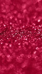 Golden color glitter background. Blurred monochrome background with bokeh. Blurred glitters shimmering dust macro close up.