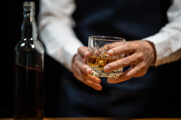 Barman pouring whiskey whiskey glass beautiful night