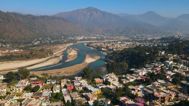 Aerial view of Srinagar city in Pauri Garhwal, the Indian state of Uttarakhand. located at the bank of Alaknanda river, 4K Indian city Drone shot.