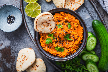 Homemade vegan Harissa carror and lentil spread with flatbread