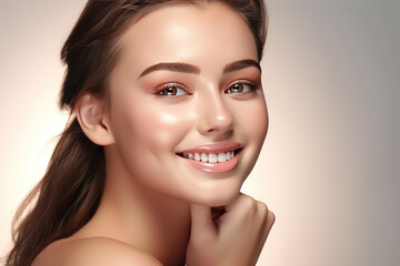 Skin care. Woman with beauty face touching healthy facial skin portrait. Beautiful smiling girl model with natural makeup touching glowing hydrated skin on light background closeup.