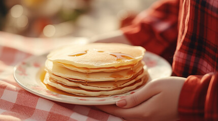 Women holding white plate with pile pancakes - Powered by Adobe