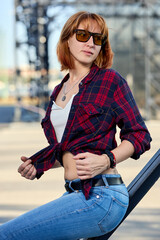 Close-up Portrait of Stylish Redhead Woman in Urban Autumn Fashion - 673664775
