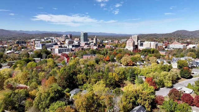 asheville nc, north carolina aerial push in in fall to skyline