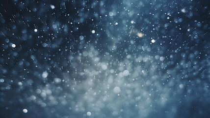 Winter snowfall and snowflakes on a blue background. Blurred Winter Background with snow flakes and...