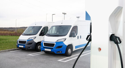 Electric delivery vans with electric vehicles charging station