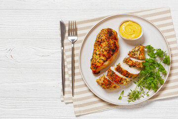 Baked Split Chicken Breasts on plate, top view