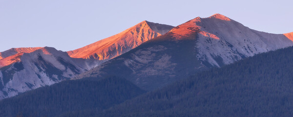 Pirin mountain peaks, Bulgaria at sunrise, banner