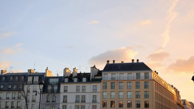 A View Of Typical French Architecture In Paris, France During Sunset. Wide Shot