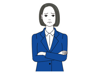 腕組みをして困っている表情のスーツ姿の女性