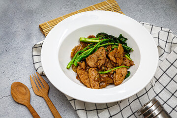 Stir-fried large noodles with black soy sauce and pork and kale - Asian food style
