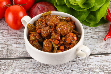 Meatball with vegetables and spices