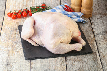 Whole raw chicken for cooking