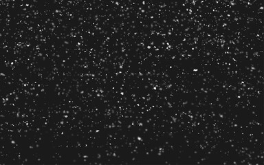 Obraz premium Flying dust particles on a black background