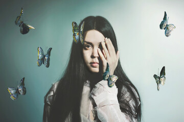 surreal woman surrounded by butterflies, abstract concept