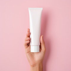 Woman hand showing cream product. Cosmetic product branding mockup. Daily skincare and body care routine. Female hand holding cosmetic product mockup, close up - obrazy, fototapety, plakaty