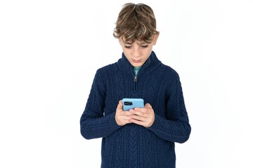 Focused Caucasian teen boy use smartphone reading social media news, or important e-mail