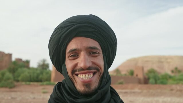 Portrait of berber man looking at camera and smiling, Morocco