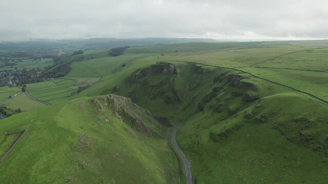 Winnats Pass on a cloudy Autumn day. Narrow road in a steep gorge, in Peak District, Derbyshire, England