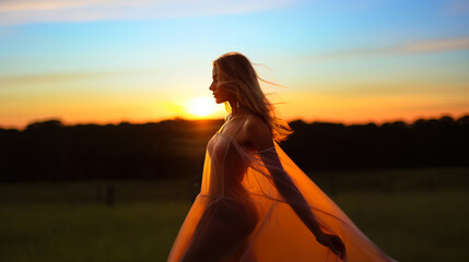 Sun shining trough woman's gown reveling her body form