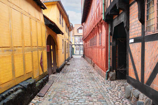 Odense, Denmark - October 21, 2023: Alley where the history museum of the city of Odense is located on the corner of Overgade 48.
