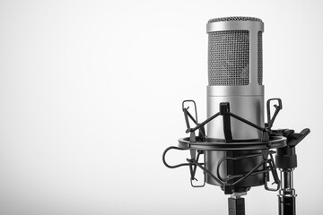 Studio microphone on the gray background. Copy space.