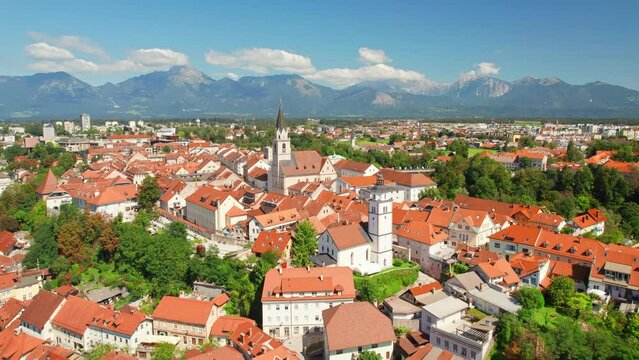 Aerial view of the Kranj old town with mountain range at background, Slovenia.