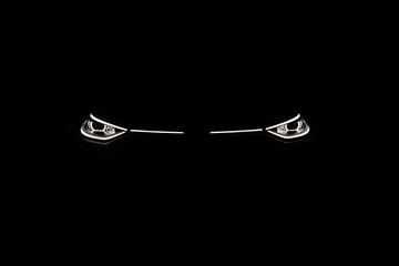 Headlight turning on switching of car LED headlights in night. New modern electric car headlamp....