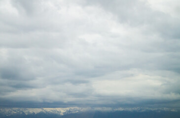 Expansive Cloudscape and Snow-Capped Peaks: A Majestic High-Altitude View of Wysokie Tatry, Poland