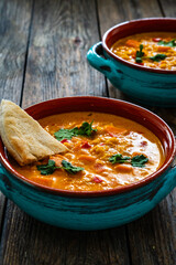 Dal soup - Indian delicious lentil soup on wooden background