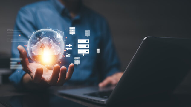 Businessman holding Cloud Share Computing Technology Internet Storage Network Concept and a large database of big data through Internet technology.Data storage and Internet service concept.