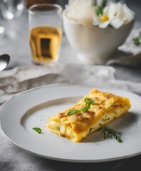 omelette for breakfast on a white porcelain plate in the restaurant

