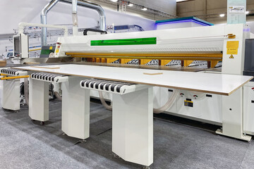 A modern automated machine for the production of finished wooden panels for furniture production.