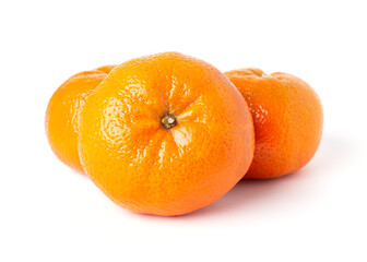 Three bright orange tangerines on white background. Mandarin front view.