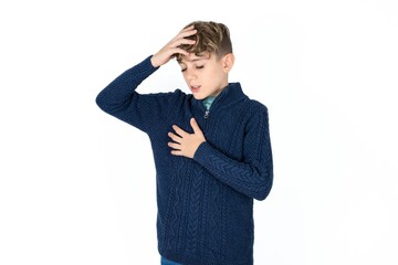Caucasian teen boy Touching forehead for illness and fever, flu and cold, virus sick.